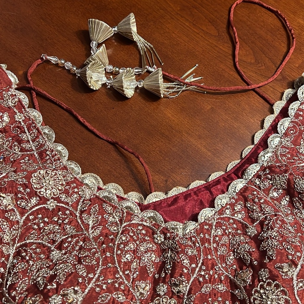 Elegant rust color lehenga with long top with crystal work - Picture 12 of 15
